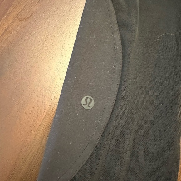Lululemon Wunder Train Mesh Panel High-Rise Tight 25"
Black - Picture 9 of 11